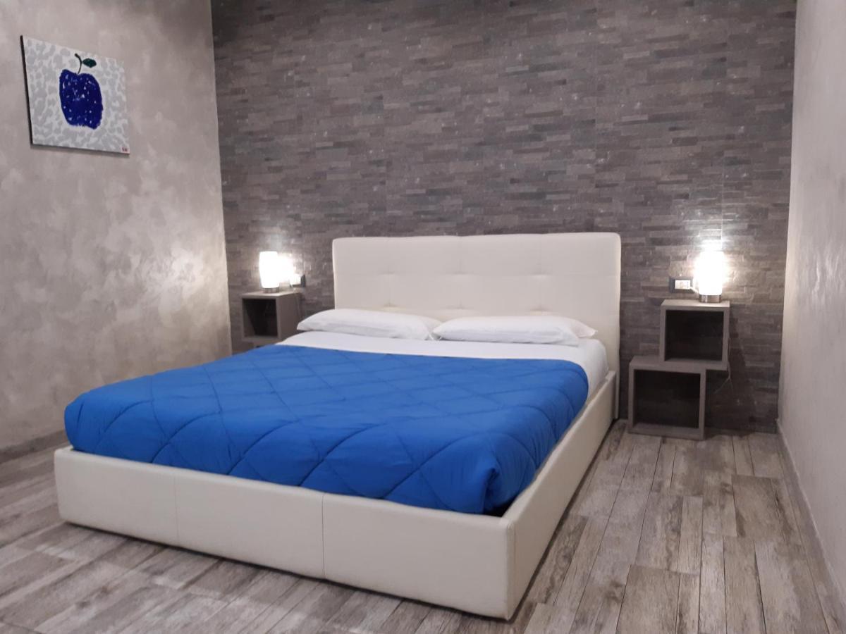 애플 룸 로마 에어포트 호텔 피우미치노 외부 사진 A bedroom